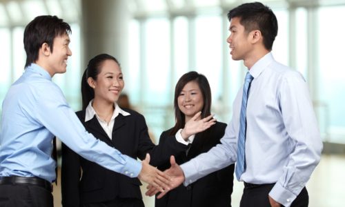 Asian Businessmen shaking hands